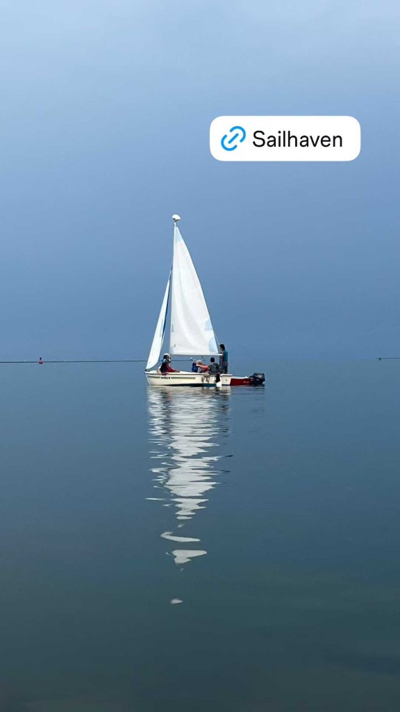 Sailboat on calm water in New Haven